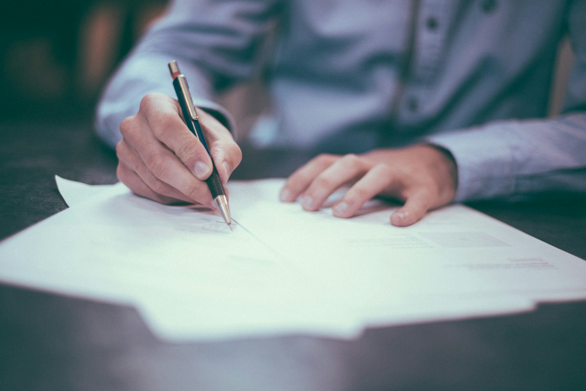 Reviewing financial paperwork at a desk
